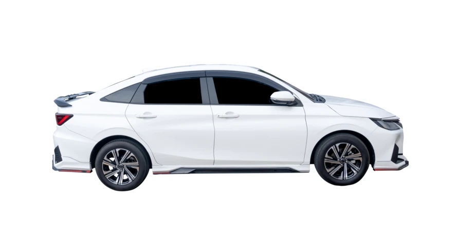 Side profile of a modern white sedan isolated on white