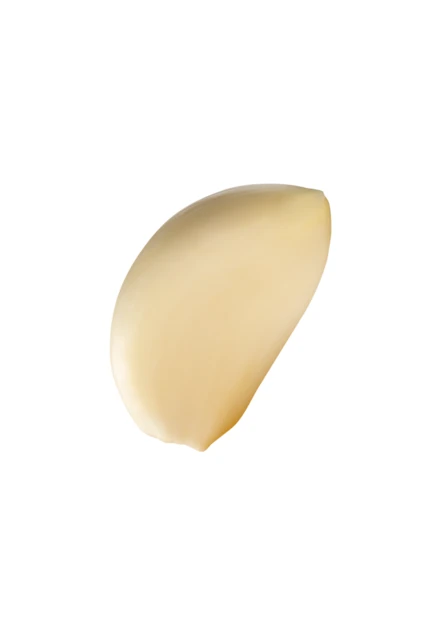 Single peeled garlic clove isolated on white background
