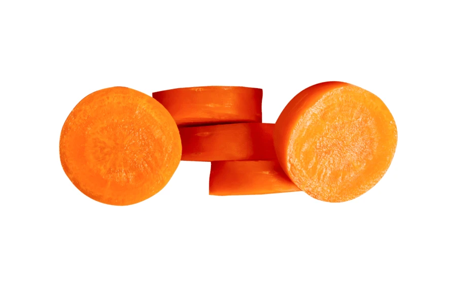 Fresh sliced carrot rounds isolated on white background