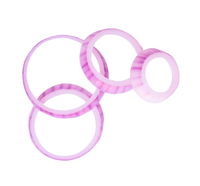 Fresh sliced red onion rings isolated on white background