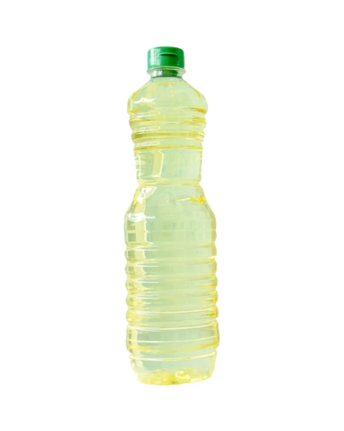 Plastic bottle of vegetable cooking oil isolated on white