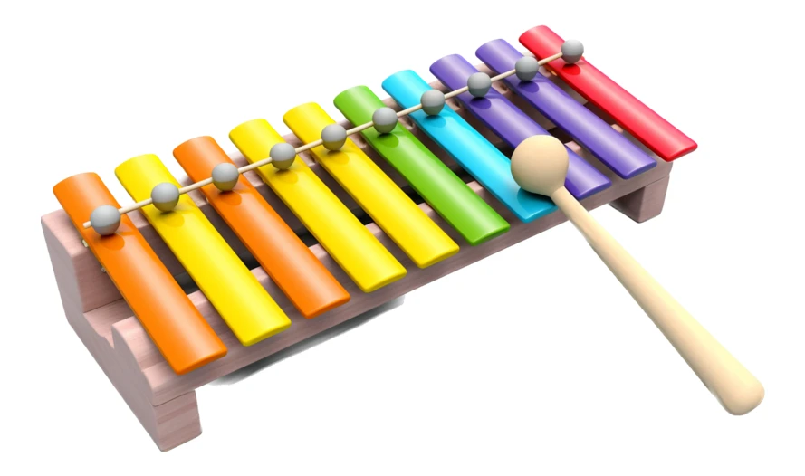 Colorful toy xylophone with wooden mallet on white background