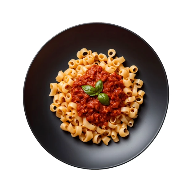 Italian pasta with bolognese sauce and basil garnish
