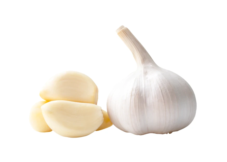Whole garlic bulb and peeled garlic cloves on white background