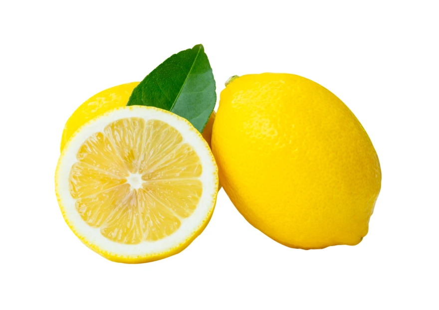 Whole and sliced fresh lemons with leaf on white background