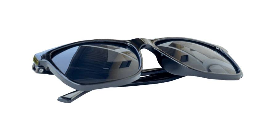 Modern black sunglasses isolated on white background
