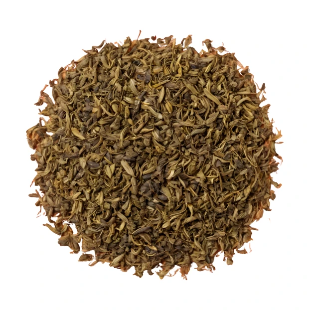 Dry loose leaf green tea isolated on white background