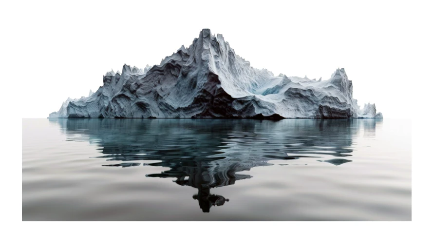 Large jagged iceberg floating in calm water with reflection