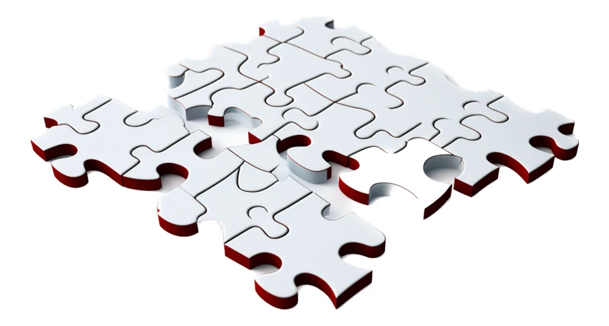 White jigsaw puzzle pieces with red edges on white background